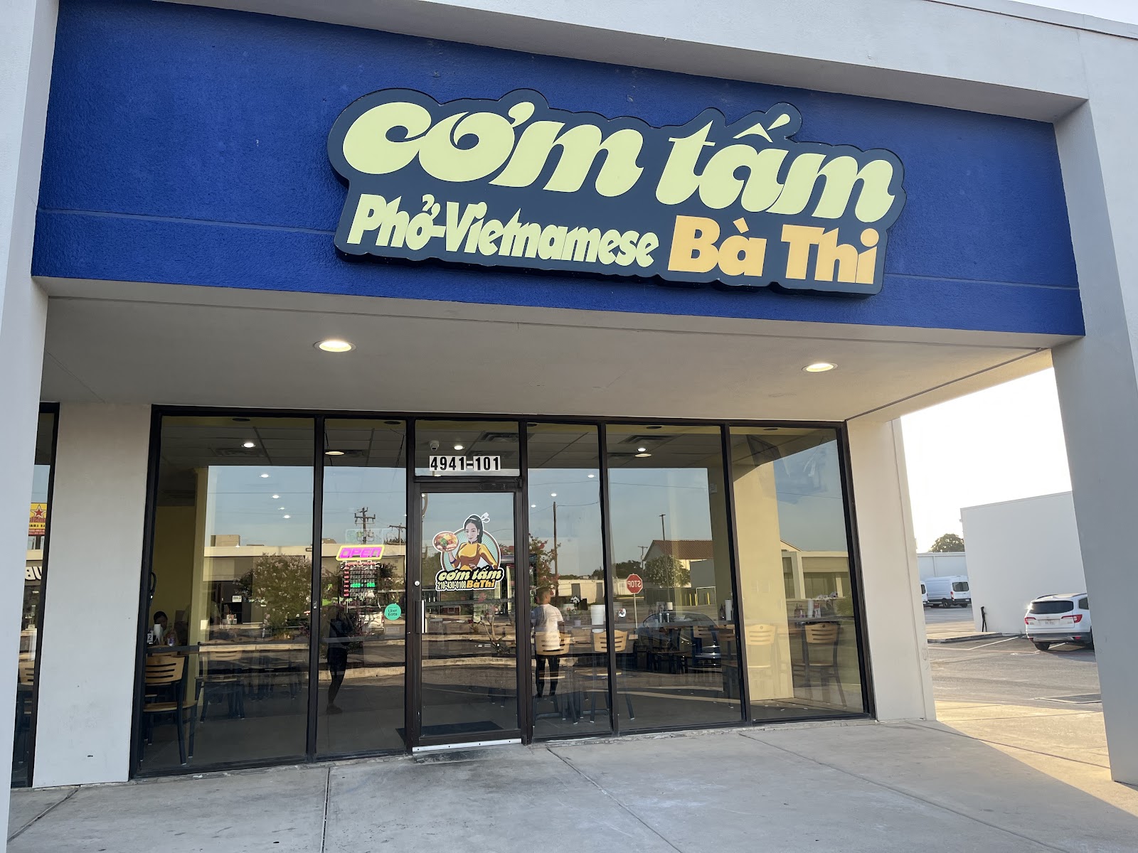Cơm Tấm Bà Thi storefront sign and entrance in San Antonio